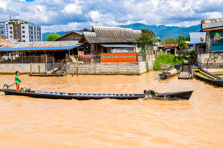 INLE LAKE, MYANMAR - AUG 30, 2016: Boats over the Inle Sap, a freshwater lake located in the...