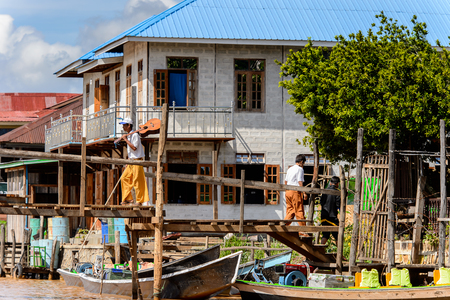 INLE LAKE, MYANMAR - AUG 30, 2016: Village over the Inle Sap,a freshwater lake located in the Nyaungshwe Township of Taunggyi District of Shan State, Myanmarのeditorial素材