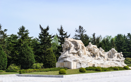 PYONGYANG, NORTH KOREA - MAY 1, 2012: Monument to the revolution in the center of Pyongyang, North Korea.  It's the capital of North Korea and translates as the "Flat Land" or "Peaceful Land"のeditorial素材