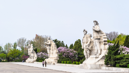 PYONGYANG, NORTH KOREA - MAY 1, 2012: Monument to the revolution in the center of Pyongyang, North Korea.  It's the capital of North Korea and translates as the "Flat Land" or "Peaceful Land"のeditorial素材