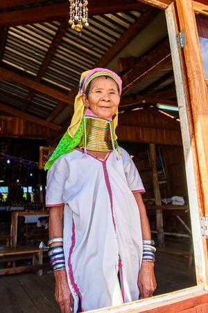 INLE LAKE, MYANMAR - AUG 30, 2016: Unidentified Burmese woman sells local neckless, Inle lake. 68 per cent of Myanma people belong to Bamar ethnic groupのeditorial素材