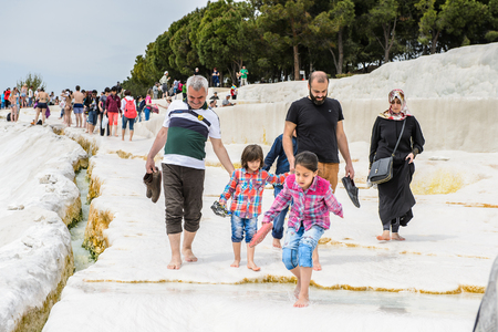 PAMUKKALE, TURKEY - APR 18, 2015: Unidentified tourists on the travertines of Pamukkale, Turkey. It's a UNESCO World Heritage siteのeditorial素材