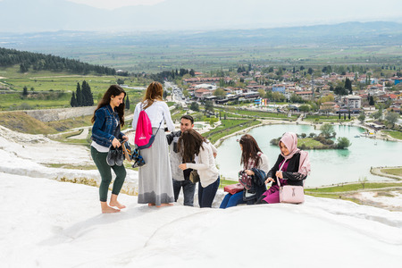 PAMUKKALE, TURKEY - APR 18, 2015: Unidentified tourists on the travertines of Pamukkale, Turkey. It's a UNESCO World Heritage siteのeditorial素材