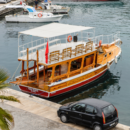 ANTALYA, TURKEY - APR 19, 2015: Ships in the old harbour in Antalya (Kaleici), Turkey. Old town of Antalya is a popular destination among  touristsのeditorial素材