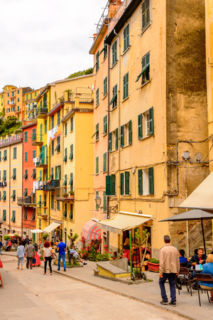 RIOMAGGIORE, ITALY - MAY 5, 2016: Central street of Riomaggiore (Rimazuu), a village in province of La Spezia, Liguria, Italy. Cinque Terre, UNESCO World Heritage Siteのeditorial素材