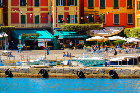 PORTOFINO, ITALY - MAY 4, 2016: Restaurants in Portofino, an Italian fishing village, Genoa province, Italy. A vacation resort with a picturesque harbour and with celebrity and artistic visitors.のeditorial素材