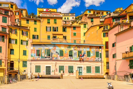 RIOMAGGIORE, ITALY - MAY 5, 2016: Central square in Riomaggiore (Rimazuu), a village in province of La Spezia, Liguria, Italy. Cinque Terre, UNESCO World Heritage Siteのeditorial素材