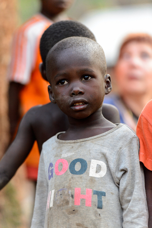 MASSIF KABYE, TOGO - JAN 13, 2017: Unidentified Togolese little boy looks ahead in the village. Togo children suffer of poverty due to the bad economy.のeditorial素材