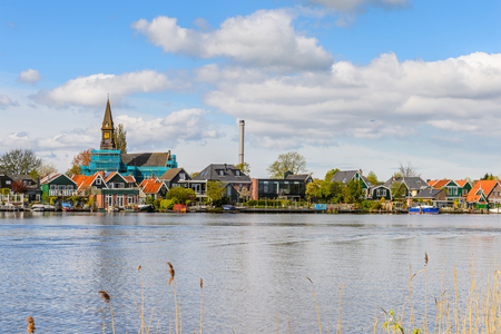 ZAANSE SCHANS, NETHERLANDS - MAY 2, 2015: Nature and windmills in Zaanse Schans, Northe Holland, Netherlands. This village is a popular touristic destination in Netherlandsのeditorial素材