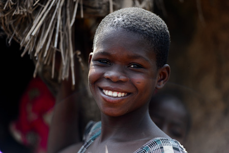 KARA REG., TOGO - JAN 14, 2017: Unidentified Konkomba boy looks ahead in the village. Konkombas are ethnic group of Togoのeditorial素材