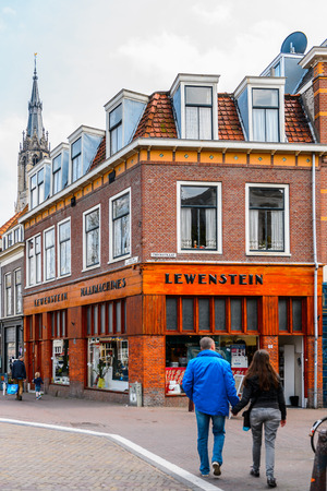 DELFT, NETHERLANDS - MAY 2, 2015: House in the center near canal of Delft, Netherlands. Delft is a popular touristic destination due to the town centre with canalsのeditorial素材