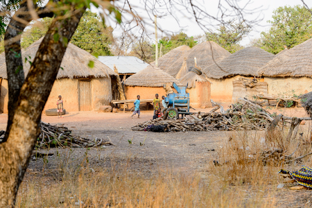 DAGOMBA VILLAGE, GHANA - JAN 14, 2017: Unidentified Dagomban children play in the yard in the local village. Dagombas are ethnic group of Northern Ghanaのeditorial素材