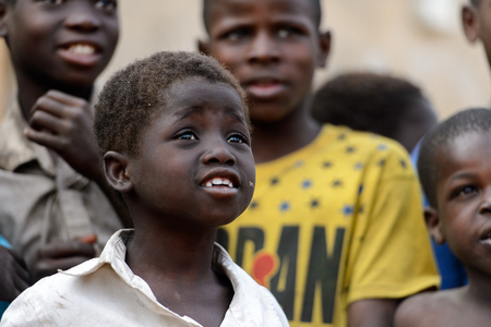 DAGOMBA VILLAGE, GHANA - JAN 14, 2017: Unidentified Dagomban boy looks ahead in the local village. Dagombas are ethnic group of Northern Ghanaのeditorial素材