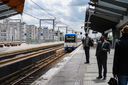 AMSTERDAM, NETHERLANDS - JUN 1, 2015: Unidentified people at the Amsterdam Bijlmer ArenA metro station. It's a  railway station in the Bijlmermeer neighbourhood of the Amsterdam Zuidoost stadsdeelのeditorial素材