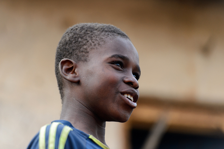 DAGOMBA VILLAGE, GHANA - JAN 14, 2017: Unidentified Dagomban boy looks ahead in the local village. Dagombas are ethnic group of Northern Ghanaのeditorial素材