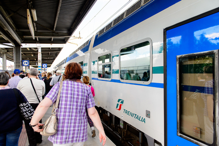 FLORENCE, ITALY - MAY 6, 2016: Trenitalia company train in at a station near Florence. Trenitalia is the primary train operator in Italyのeditorial素材
