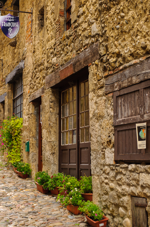 PEROUGES, FRANCE - OCT 11, 2016: Medieval house in Perouges, France, a walled town, a popular touristic attraction.のeditorial素材