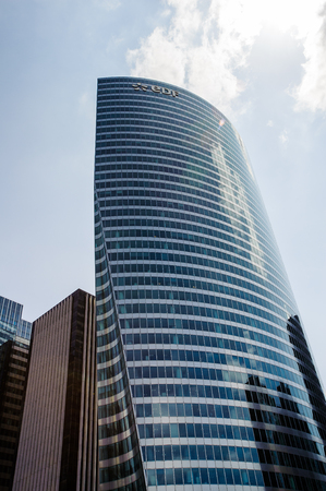 PARIS, FRANCE - JUN 18, 2014: Modern glass architecture of the La Defense district. La Defense is the major business district of the Paris, Franceのeditorial素材