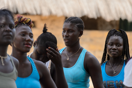 ORANGO ISL., GUINEA BISSAU - MAY 3, 2017: Unidentified local Women sing and dance during Vaca Bruto, traditional Mask danceのeditorial素材