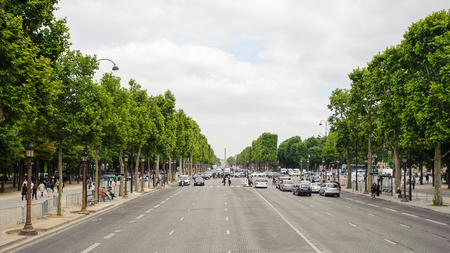 PARIS, FRANCE - JUN 17, 2014: Avenue des Champs-Elysees in Paris, France. Champs-Elysees is one of the world's most famous streets, and is one of the most expensive strips of real estate in the worldのeditorial素材
