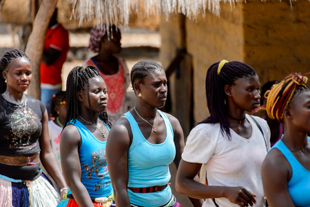 ORANGO ISL., GUINEA BISSAU - MAY 3, 2017: Unidentified local Women dance national dance during Vaca Bruto, traditional Mask danceのeditorial素材