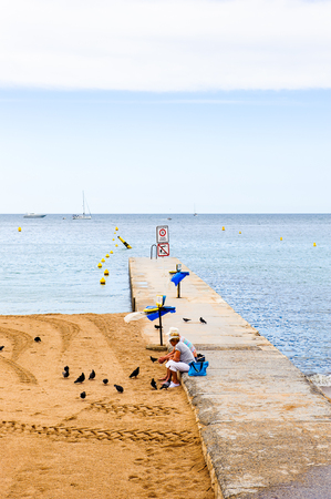 CANNES, FRANCE - JUNE 25, 2014: Beach of the Mediterranean Sea, Cote d'Azur, Cannes. Cannes hosts the annual Cannes Film festival from 1949のeditorial素材