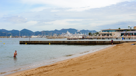 CANNES, FRANCE - JUNE 25, 2014: Beach of the Mediterranean Sea, Cote d'Azur, Cannes. Cannes hosts the annual Cannes Film festival from 1949のeditorial素材