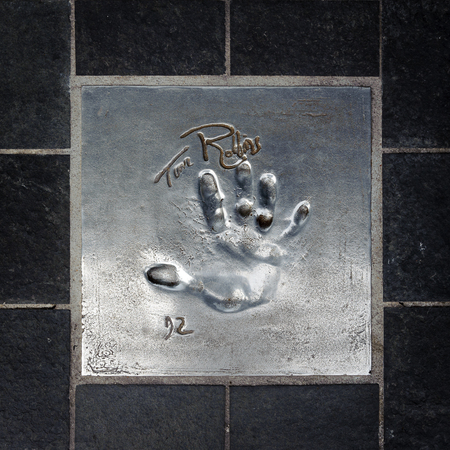 CANNES, FRANCE - JUN 25, 2014: Tim Robbins hand mark on the alley of fame in Cannes, Cote d'Azur,...