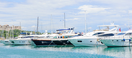 ANTIBES, FRANCE - JUN 25, 2014: Expensive achts in the Port of Antibes, Cote d'Azur, France. Antibes was founded as a 5th-century BC Greek colony and was called Antipolisのeditorial素材