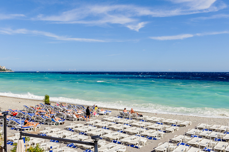 NICE, FRANCE - JUNE 25, 2014: Beach of the Mediterranean sea, Cote d Azur,Nice, France. Nice is the capital of the Alpes Maritimes departementのeditorial素材