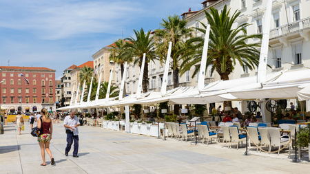 SPLIT, CROATIA - AUG 22, 2014: Unidentified people in a restaurant in Split, Croatia. Split is the largest city of the region of Dalmatia and a popular touristic destinationのeditorial素材