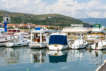 CIOVO, CROATIA - AUG 22, 2014: Boats on the Adriatic Sea near the coast of Ciovo, small Croatian Island. Ciovo is an island in the Adriatic Sea with area of 28.8 km2のeditorial素材