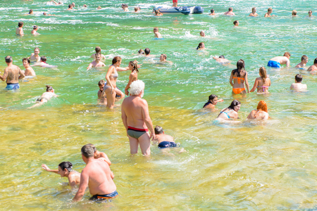 KRKA NATIONAL PARK, CROATIA - AUG 26, 2014: Unidentified tourists swim in the Krka River in the Krka National Park in Croatia. It is one of the National Parks in Croatia with an area of 109 square kilometersのeditorial素材