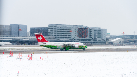 ZURICH, SWITZERLAND - JAN 26, 2015: Plane of the Swiss International Air Lines in the Zurich Kloten Airport, the largest international airport of Switzerlandのeditorial素材