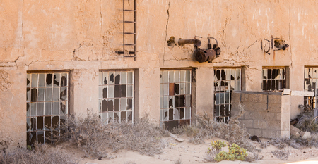 Abandoned house in the sandの写真素材