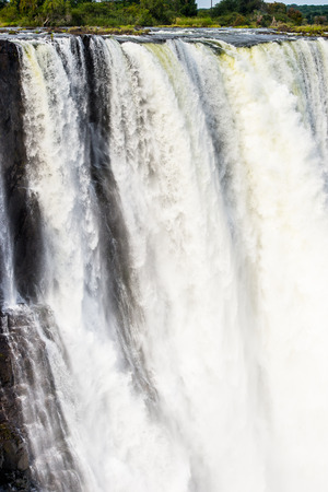 Spectacular view of Victoria Falls, Zambezi River, Zimbabwe and Zambiaの写真素材