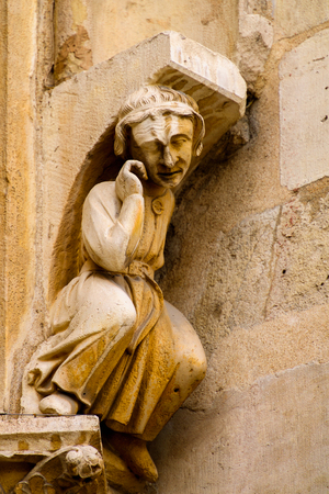 Close up of the statues at the Notre-Dame de Paris, a medieval Catholic cathedral of Paris, Franceの写真素材
