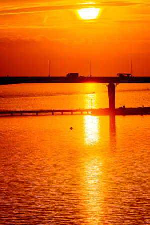 Bridge on the Sunset over the sea in Russiaの写真素材