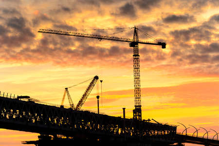 Bridge under construction in Russia on the Sunset over the sea in Russiaの写真素材