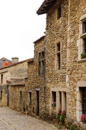 Old stone house in  Perouges, France, a medieval walled town, a popular touristic attraction.の写真素材