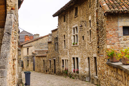 Old stone house in  Perouges, France, a medieval walled town, a popular touristic attraction.の写真素材
