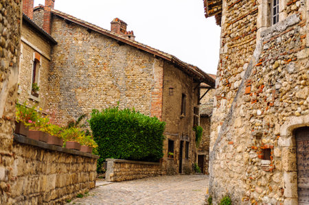 Old stone house in  Perouges, France, a medieval walled town, a popular touristic attraction.の写真素材
