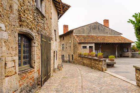 Old stone house in  Perouges, France, a medieval walled town, a popular touristic attraction.の写真素材