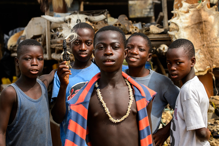 LOME, TOGO - Jan 9, 2017: Unidentified Togolese group of boys at the Lome fetish market. Togo people...