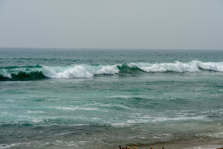 LOME, TOGO - Jan 9, 2017: The coast of the Gulf of Guinea. Togo people suffer of poverty due to the bad economyのeditorial素材