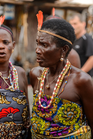 OUIDAH, BENIN - Jan 10, 2017: Unidentified Beninese woman in national suit wears necklace and earings at the voodoo festival, which is anually celebrated on January, 10th.のeditorial素材