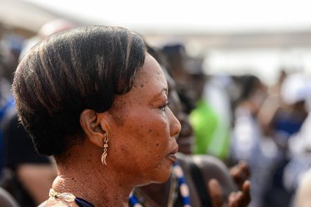 OUIDAH, BENIN - Jan 10, 2017: Unidentified Beninese woman wears necklace and earings at the voodoo festival, which is anually celebrated on January, 10th.のeditorial素材