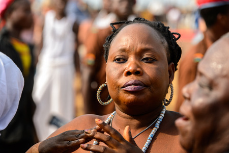 OUIDAH, BENIN - Jan 10, 2017: Unidentified Beninese woman wears necklace and earings at the voodoo festival, which is anually celebrated on January, 10th.のeditorial素材