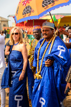 OUIDAH, BENIN - Jan 10, 2017: Unidentified Beninese  man in national suit wears necklace at the voodoo festival, which is anually celebrated on January, 10th.のeditorial素材