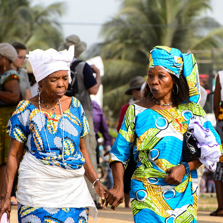 OUIDAH, BENIN - Jan 10, 2017: Unidentified Beninese woman in national suit wears necklace and earings at the voodoo festival, which is anually celebrated on January, 10th.のeditorial素材